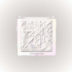 Clio Prism Highlighter #03 Frozen Crystal i en transparent förpackning med kristallklar yta och reflekterande finish.