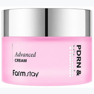 Rosa hudkräm i burk med silverlock, märkt Advanced Cream och Farm stay