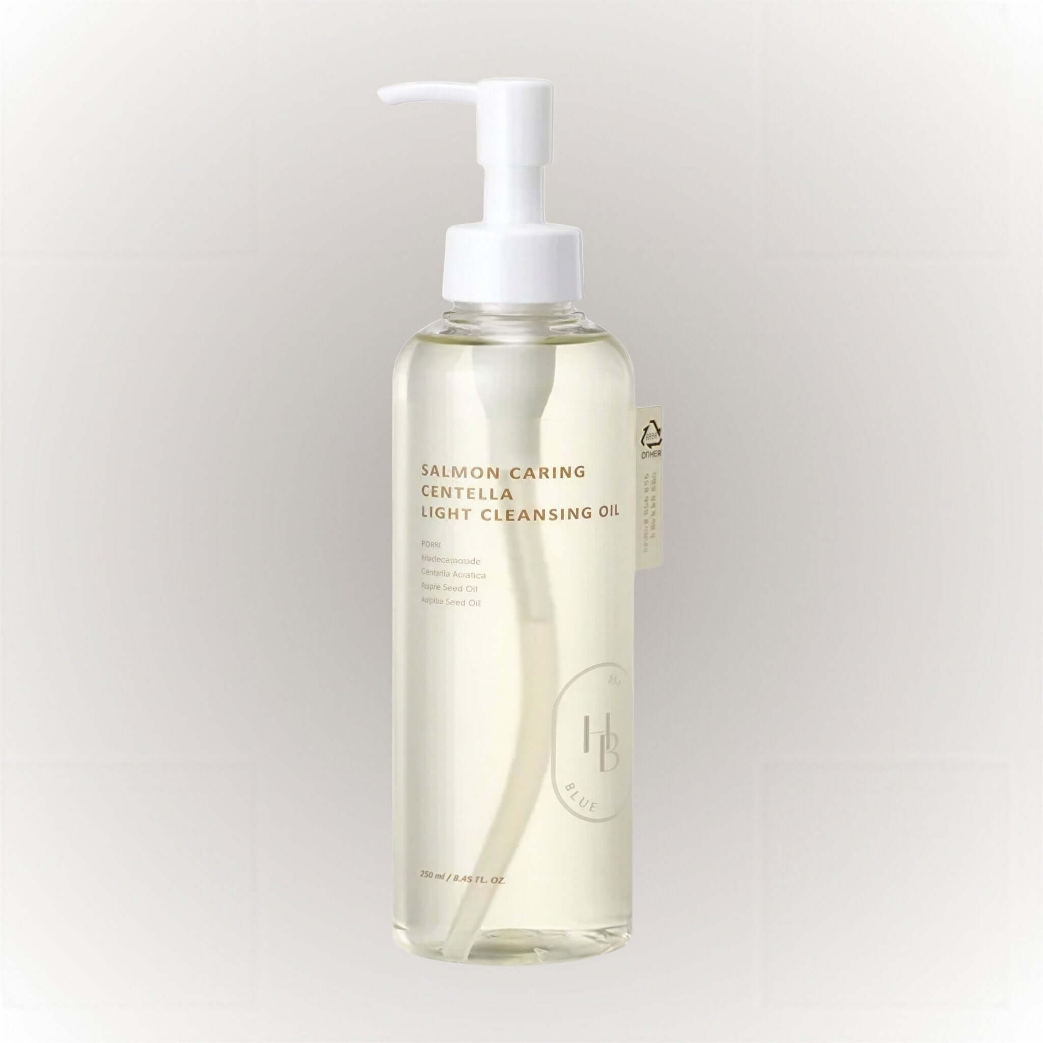 Heveblue Salmon Caring Centella Light Cleansing Oil 250ml i en genomskinlig flaska med pump för enkel applicering.