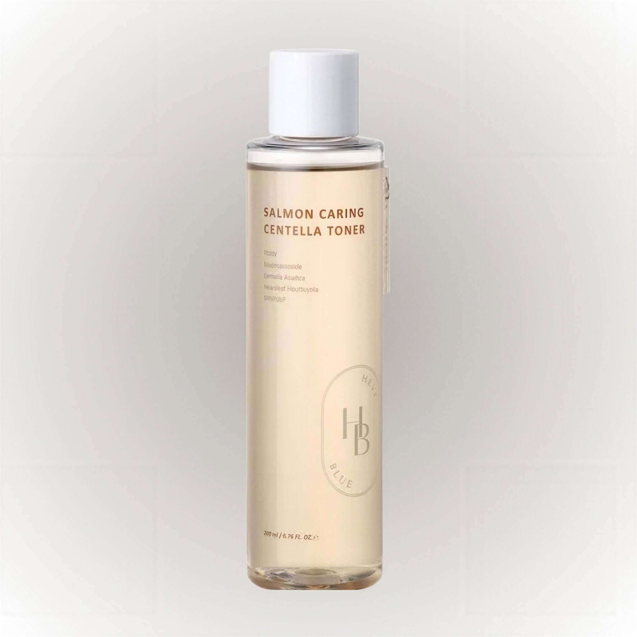 Heveblue Salmon Caring Centella Toner 200ml i en flaska med etikettext och genomskinlig vätska.