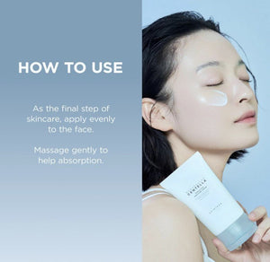 Kvinna som använder SKIN1004 Madagascar Centella Hyalu-Cica Water-Fit Sun Serum för ansiktet.