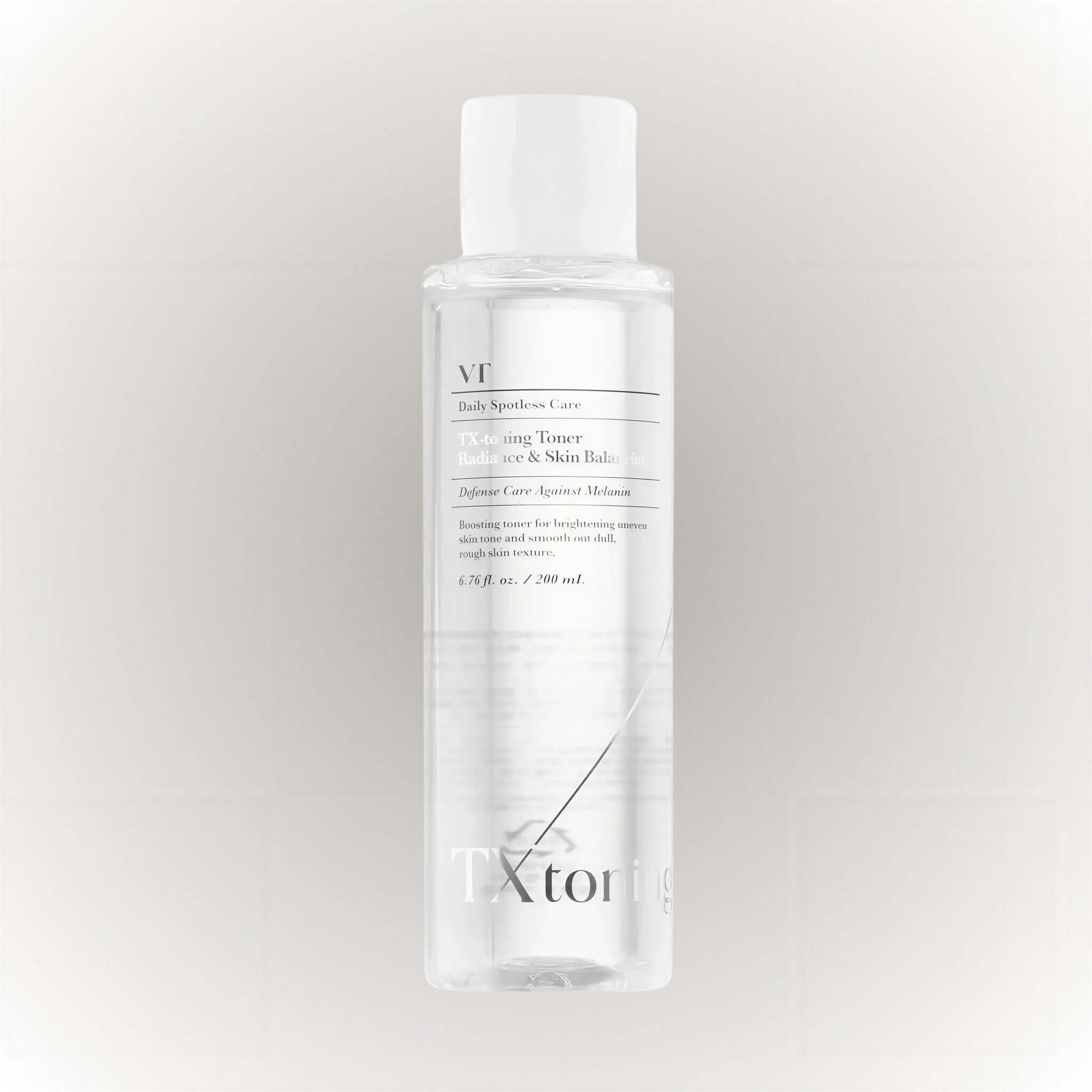 VT Cosmetics Daily Spotless Care TX-Toning Toner 200ml i transparent flaska med vit kork.