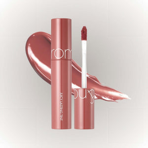 rom&nd Juicy Lasting Tint #11 Pink Pumpkin med pensel i en glansig, rosa färg