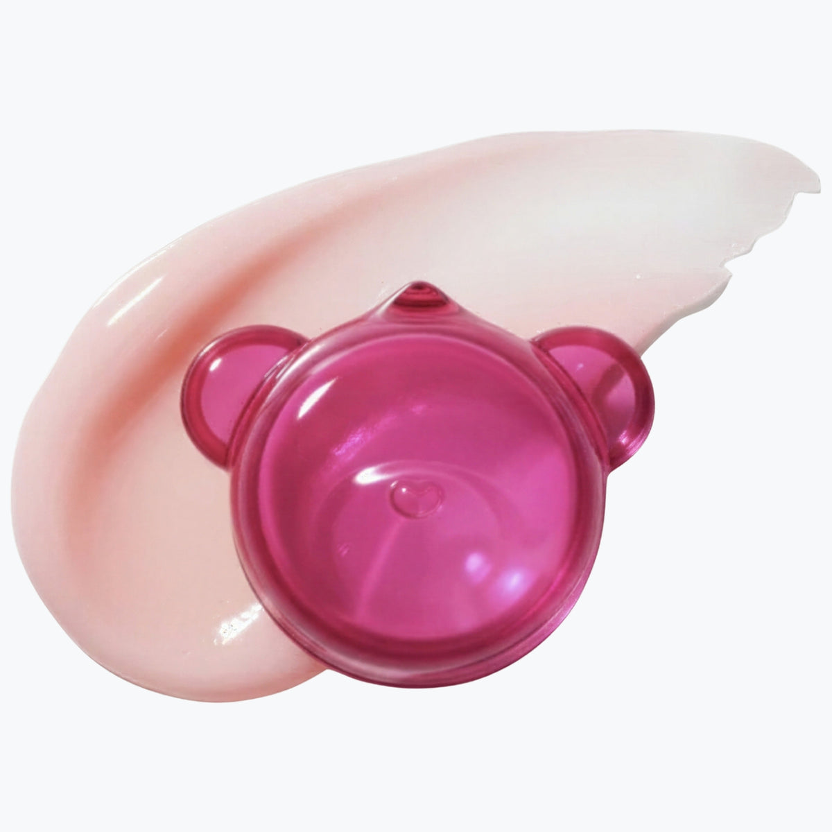 Rosa läppmask i rund behållare med lock