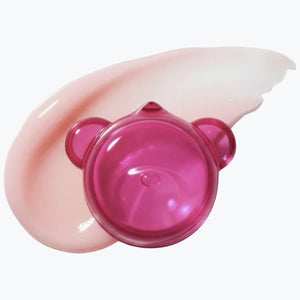 Rosa läppmask i rund behållare med lock