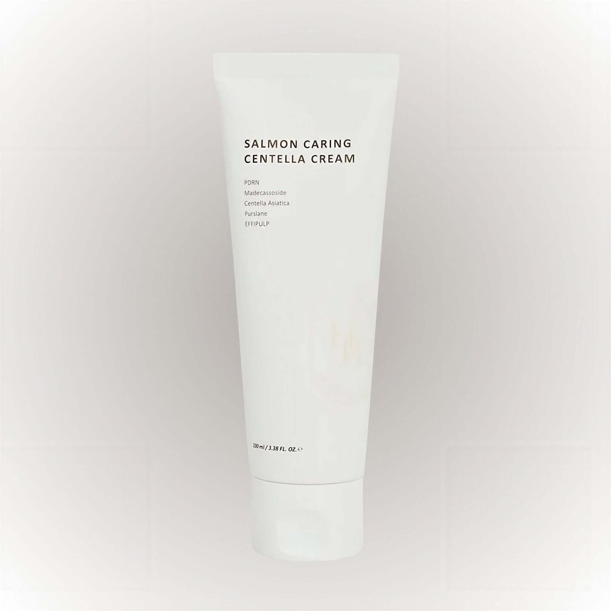 Heveblue Salmon Caring Centella Cream 50ml i en vit tub med enkel design för ansiktsvård.