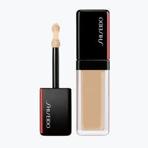 Concealer från Shiseido Synchro Skin med ljus nyans och applikatorpensel