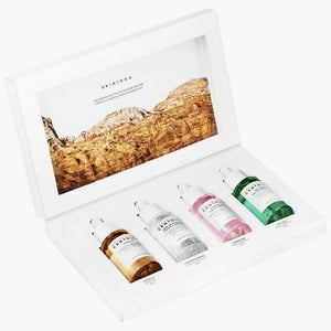 SKIN1004 presentask med 4 ampuller, vit ask med brun, rosa och grön etikett