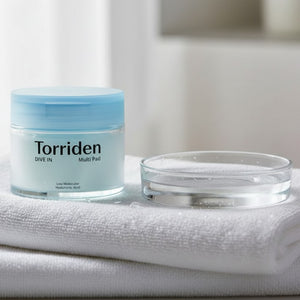 Torriden DIVE IN multi pad-kruka med lock och öppen förpackning med pads