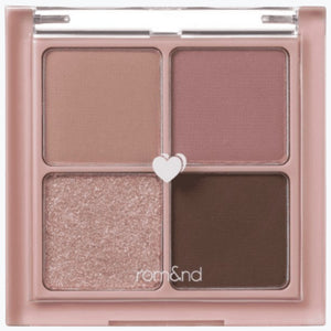 rom&nd ögonskuggspalett med fyra nyanser: beige, rosé, skimrande roséguld och mörkbrun.